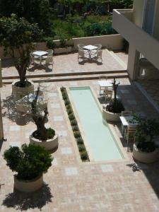 Vonkajšia záhrada v ubytovaní Happyland Hotel Apartments