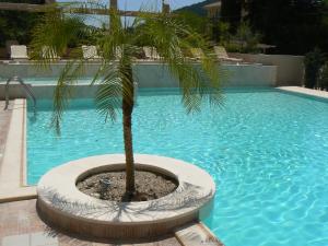 Bazén v ubytovaní Happyland Hotel Apartments alebo v jeho blízkosti