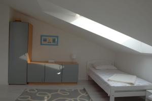 Postel nebo postele na pokoji v ubytování Apartment Dubravka