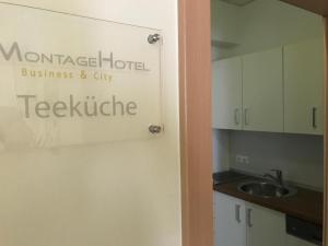Kuchyň nebo kuchyňský kout v ubytování Business & City