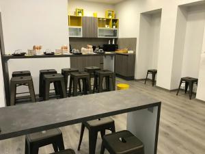 A restaurant or other place to eat at Sensation House