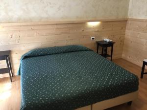 Postel nebo postele na pokoji v ubytování Al Garibaldino