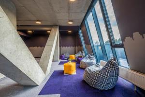 Uma área de estar em Urbihop Hotel