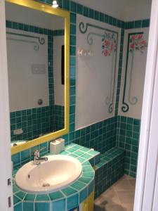 Ванная комната в Residence I Cormorani Bis