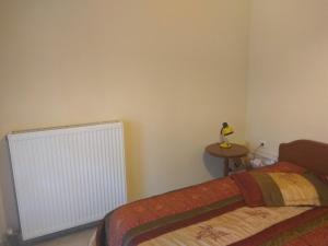 Postel nebo postele na pokoji v ubytování Ioannis Stagkonis Apartment