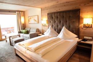 Voodi või voodid majutusasutuse Hotel Bogner Hof toas