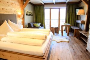 Voodi või voodid majutusasutuse Hotel Bogner Hof toas