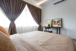 Postel nebo postele na pokoji v ubytování Palm Armada Residence Free Parking and Netflix + 23 fotografií
