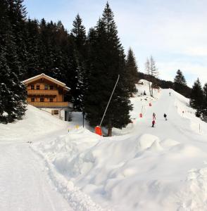 Family Lodge Maximilian v zimě