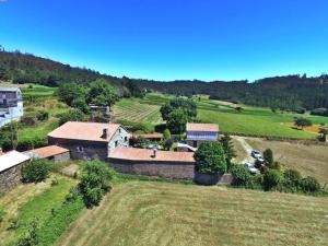 an aerial view of a house in a field at Casa Refugio de Verdes in Verdes