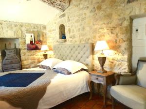 Postel nebo postele na pokoji v ubytování Un Patio en Luberon