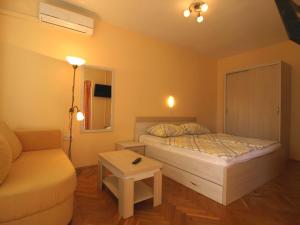 Postel nebo postele na pokoji v ubytování Guest House Sandra