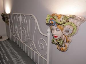 Postel nebo postele na pokoji v ubytování B&B Maison Blanche