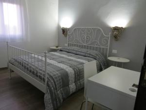 Postel nebo postele na pokoji v ubytování B&B Maison Blanche