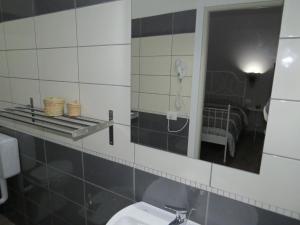 Koupelna v ubytování B&B Maison Blanche