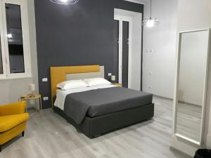 A bed or beds in a room at Sensation House
