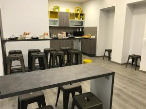 A restaurant or other place to eat at Sensation House