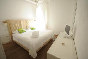 Posteľ alebo postele v izbe v ubytovaní B&B Suite Home Trani