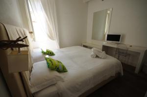 Posteľ alebo postele v izbe v ubytovaní B&B Suite Home Trani