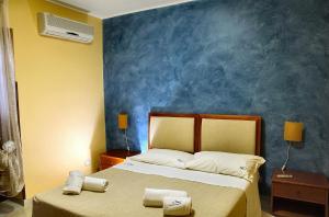 Posteľ alebo postele v izbe v ubytovaní MiraMare Residence Cefalú