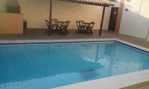 Hotel Sambaquis游泳池或附近泳池