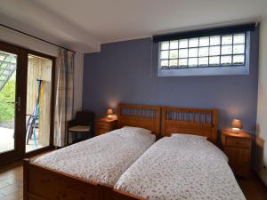 Rúm í herbergi á Holiday Home in Waimes