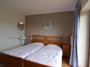 Tempat tidur dalam kamar di Panoramic Retreat, Thirimont