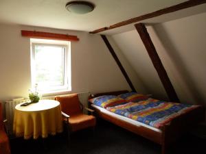 Letto o letti in una camera di Ubytování Mlýn