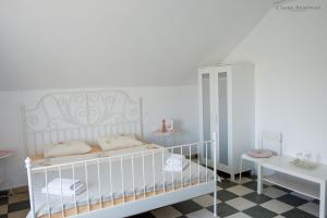Postel nebo postele na pokoji v ubytování SpeedHouse
