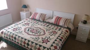 Postel nebo postele na pokoji v ubytování Villa Pio Accommodation Cong