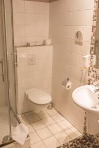 Ein Badezimmer in der Unterkunft Landhotel Windlicht