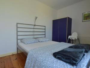 Uma cama ou camas num quarto em Holiday Home in Heppenbach with Garden