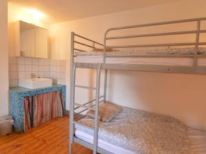 Uma cama ou camas num quarto em Holiday Home in Heppenbach with Garden
