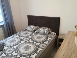 Posteľ alebo postele v izbe v ubytovaní Nordic Apartamenty Suraska