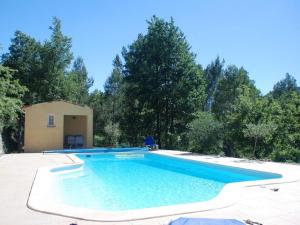 a swimming pool in the backyard of a house at Tranquil Villa in Bargemon with Private Pool in Bargemon