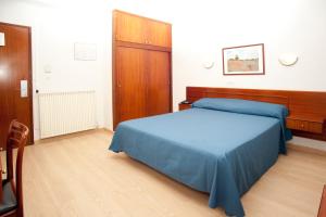 Postel nebo postele na pokoji v ubytování Hotel Roca