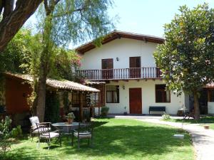a view of the house from the yard at Casa de Campo Santa Rosa in Cajamarca