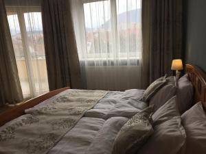 Postel nebo postele na pokoji v ubytování Kiem Premium Apartments