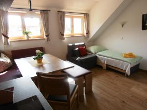 A bed or beds in a room at Appartements Macheiner