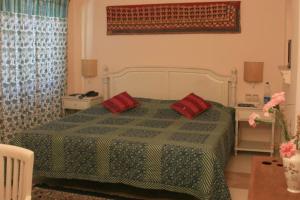 Letto o letti in una camera di Rawla Rawatsar