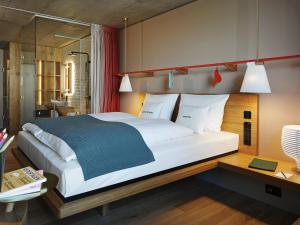 Ліжко або ліжка в номері 25hours Hotel Langstrasse