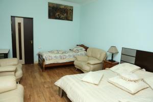 Postel nebo postele na pokoji v ubytování Inter Boutique Hotel