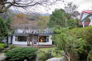 Un jardín fuera de 福緣山莊 桃園市民宿004號