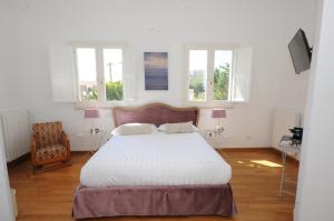 Postel nebo postele na pokoji v ubytování Maremaris B&B