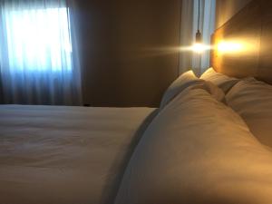 Posteľ alebo postele v izbe v ubytovaní Hotelet de Sant joan
