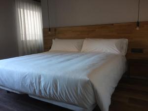 Posteľ alebo postele v izbe v ubytovaní Hotelet de Sant joan