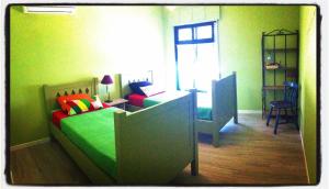 Postel nebo postele na pokoji v ubytování Al-Gharb Tavira Eco GuestHouse