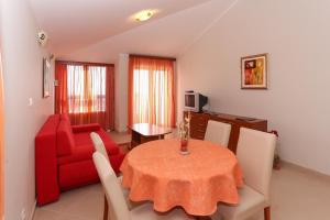 Posedenie v ubytovaní Apartments and Rooms Astoria