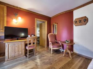 Televiisor ja/või meelelahutuskeskus majutusasutuses Hotel Bertelli