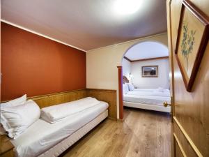 Voodi või voodid majutusasutuse Hotel Bertelli toas